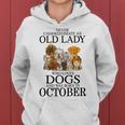 Never Underestimate An Old Lady Who Loves Dogs Born October Women Hoodie