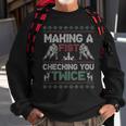 Making A Fist Checking You Twice Ugly Christmas Pajama Party Sweatshirt Gifts for Old Men