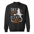 Thick Thighs Spooky Vibes Pretty Eyes Witch Halloween Party Sweatshirt