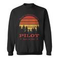 Never Underestimate A Pilot Flying Planes Retro Sunset Sweatshirt