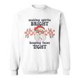 Making Spirits Bright Keeping Faces Tight Santa Christmas Sweatshirt
