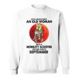 Never Underestimate An Old Woman Mobility Scooter September Old Woman Funny Gifts Sweatshirt
