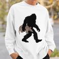 Bigfoot Cradling Armadillo Cryptid Sasquatch Sweatshirt Gifts for Him