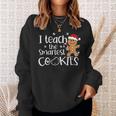 I Teach The Smartest Cookies Christmas Gingerbread Santa Hat Sweatshirt Gifts for Her