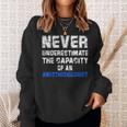 Never Underestimate The Capacity Of An Anesthesiologist Sweatshirt Gifts for Her