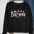 Believe Christmas Santa Claus Reindeer Candy Cane Xmas Sweatshirt Gifts for Old Women