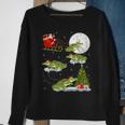 Xmas Lighting Tree Santa Riding Alligator Christmas Sweatshirt Gifts for Old Women