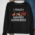 I Teach Masked Superheroes Pumpkin Animals Lovers Pumpkin Sweatshirt Gifts for Old Women