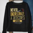 Never Underestimate A Detective's Job Sweatshirt Gifts for Old Women