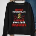 Never Underestimate Love Dragons Graphic Sweatshirt Gifts for Old Women