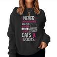 Never Underestimate An Old Woman Who Loves Cats & Books Gift Gift For Womens Women Crewneck Graphic Sweatshirt