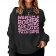 Womens Bodies Are More Regulated Than Guns Pro-Choice Women Crewneck Graphic Sweatshirt Womens Bodies Are More Regulated Than Guns Pro-Choice Women Crewneck Graphic Sweatshirt