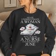 Never Underestimate A Woman Who Is A Nurse Born In June Women Crewneck Graphic Sweatshirt Gifts for Her