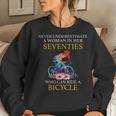 Never Underestimate Woman In Her Seventies Rides A Bicycle Women Sweatshirt Gifts for Her