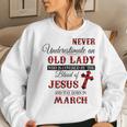 Never Underestimate An Old Lady Love Jesus Born In March Women Crewneck Graphic Sweatshirt Gifts for Her