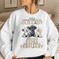 Never Underestimate Old Lady Loves Dogs Born In February Women Sweatshirt Gifts for Her