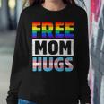 Free Mom Hugs Groovy Rainbow Heart Lgbt Flag Pride Month Women Sweatshirt Unique Gifts