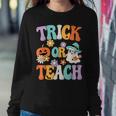 Groovy Halloween Trick Or Teach Retro Pumpkin Ghost Teacher Women Sweatshirt Unique Gifts