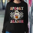 Groovy Spooky Season Retro Ghost Holding Pumpkin Halloween Women Sweatshirt Unique Gifts