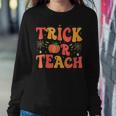 Groovy Trick Or Teach Halloween Teacher Life Girl Women Sweatshirt Unique Gifts