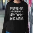 Its Not Easy Being My Hot Wifes Arm Candy Humor Husband Joke For Husband Women Sweatshirt Unique Gifts