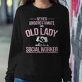 Never Underestimate Old Lady Social Worker Social Work Gift For Womens Women Crewneck Graphic Sweatshirt Funny Gifts