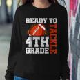 Ready To Tackle Fourth Grade First Day Of School Football Women Sweatshirt Funny Gifts