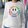Field Day Fun Day 2023 Groovy Smile Face Funny Teacher Kids Women Crewneck Graphic Sweatshirt Personalized Gifts