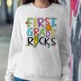 First Grade Rocks Back To School Teacher Students Women Crewneck Graphic Sweatshirt Funny Gifts