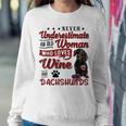 Never Underestimate An Old Woman Who Loves Wine & Dachshund Women Crewneck Graphic Sweatshirt Funny Gifts