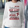 Never Underestimate An Old Lady Was Born In December Women Sweatshirt Personalized Gifts