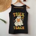 Trick Or Teach Groovy Halloween Retro Floral Ghost Teacher Women Tank Top Unique Gifts