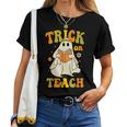 Trick Or Teach Groovy Halloween Retro Floral Ghost Teacher Women T-shirt