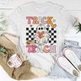 Trick Or Teach Groovy Halloween Retro Floral Ghost Teacher Women T-shirt Unique Gifts