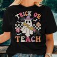 Trick Or Teach Groovy Teacher Halloween Retro Floral Ghost Women T-shirt Gifts for Her