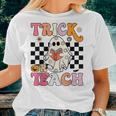 Trick Or Teach Groovy Halloween Retro Floral Ghost Teacher Women T-shirt Gifts for Her