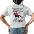 Never Underestimate A Woman In Her Seventies Rides A Horse Womens Back Print T-shirt