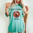 Never Underestimate An Old Woman Who Loves Football Women's Oversized Comfort T-shirt Chalky Mint