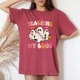Teaching My Boos Spooky Teacher Ghost Halloween Groovy Retro Women's Oversized Comfort T-Shirt Crimson