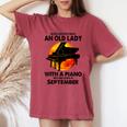 Never Underestimate An Old Lady With A Piano Born September Women's Oversized Comfort T-Shirt Crimson