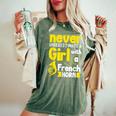 Never Underestimate A Girl With A French Horn Women's Oversized Comfort T-Shirt Moss