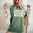 Wife Somebodys Spoiled Ass Wife Retro Groovy Women's Oversized Comfort T-shirt Moss