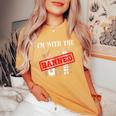 Im With The Banned Books For A Literature Teacher Women's Oversized Comfort T-shirt Mustard