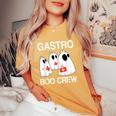 Spooky Gastro Boo Crew Halloween Costume Gi Nurse Women's Oversized Comfort T-Shirt Mustard