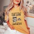 Never Underestimate An Old Lady Who Loves Books And Coffee Women's Oversized Comfort T-Shirt Mustard