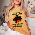 Never Underestimate An Old Lady With A Piano Born September Women's Oversized Comfort T-Shirt Mustard