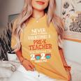 Never Underestimate A Pre-K Teacher Women's Oversized Comfort T-Shirt Mustard