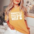 Wife Somebodys Spoiled Ass Wife Retro Groovy Women's Oversized Comfort T-shirt Mustard