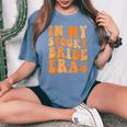 Halloween In My Spooky Bride Era Groovy Wedding Bachelorette Women's Oversized Comfort T-Shirt Blue Jean