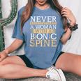 Never Underestimate A Woman With A Bionic Spine Surgery Women's Oversized Comfort T-Shirt Blue Jean